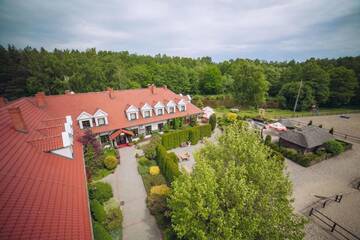 Фото Комплексы для отдыха с коттеджами/бунгало Hubertus Aparthotel &amp; Restaurant &amp; Horse Club г. Старогард-Гданьский 1